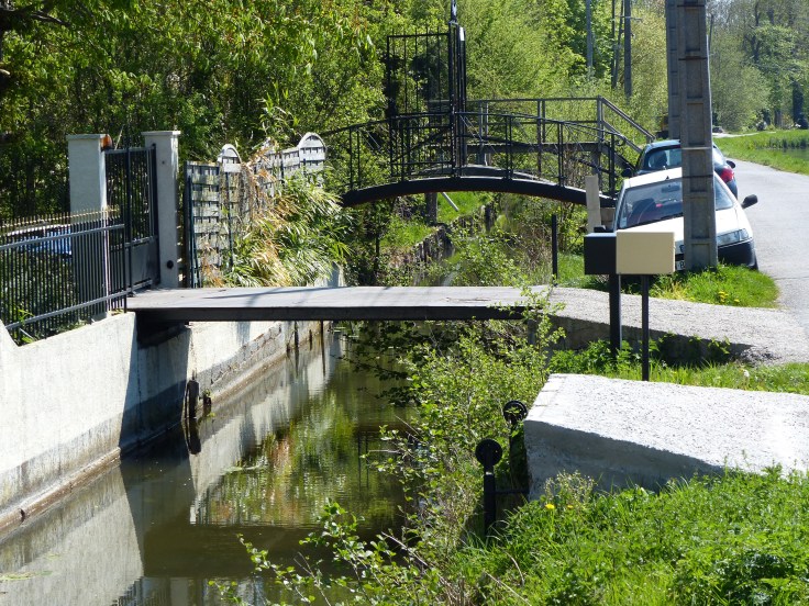 The little access bridges from the houses across the moat
