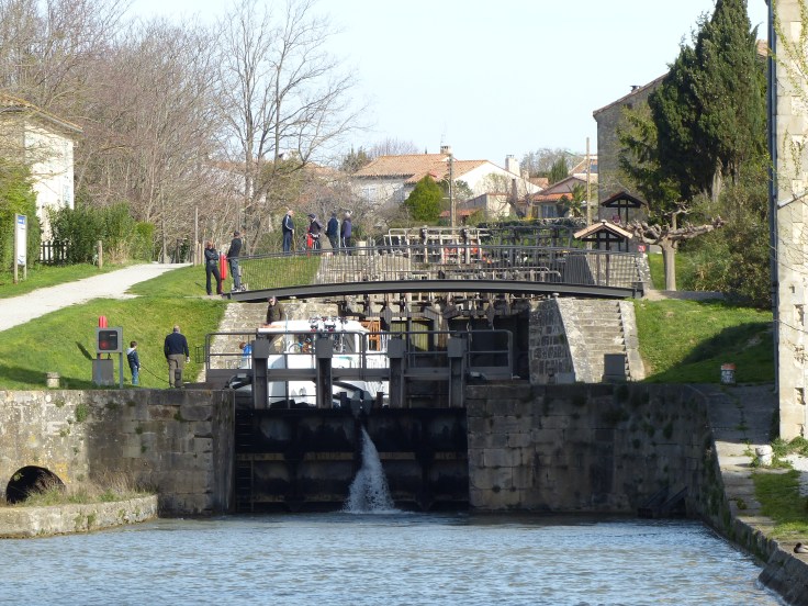 The lock beginning to open to let a boat through