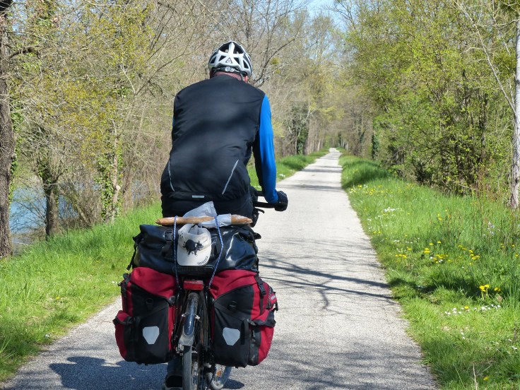 Steve rides prepared for lunch just like a local...a baguette on the bike rack!