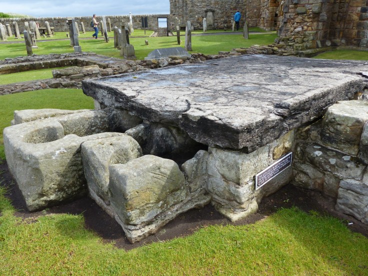 This was a grave slab. It's been moved to reveal the coffins underneath