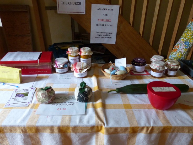 The charm of village life. "Produce in the Porch"