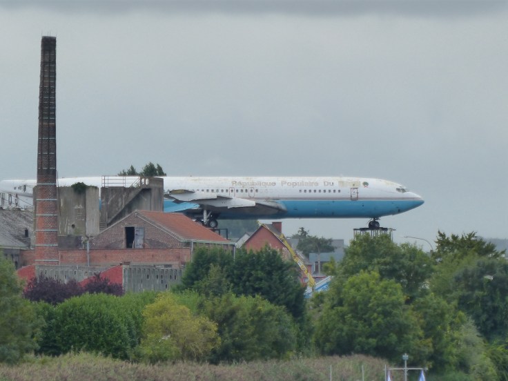 ...and some new. Beware low flying aircraft! This plane was actually sitting in the yard of some sort of warehouse or scrap metal place