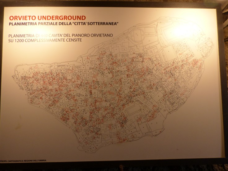A map of Orvieto. The black lines are the city above ground. The red lines are the underground caves, so it's a vast network.